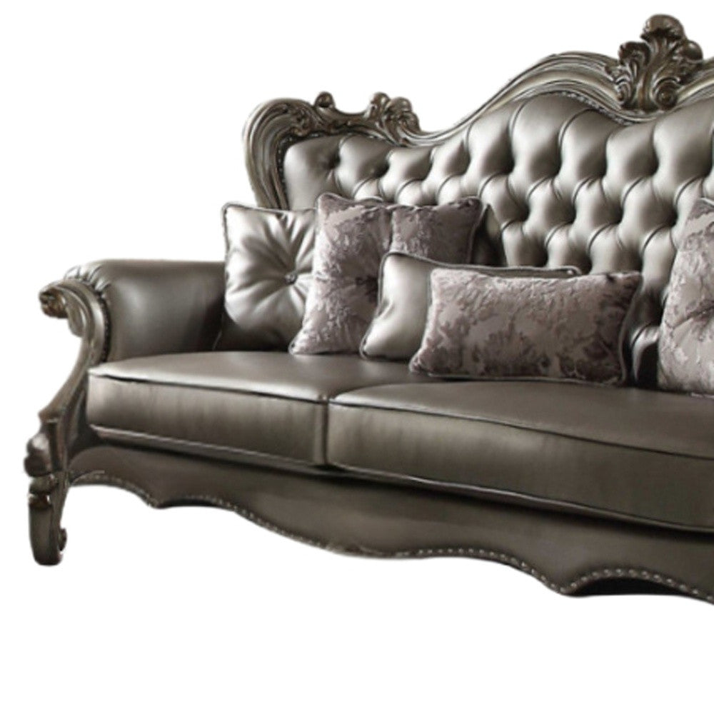 Faux Leather Curved Sofa and Toss Pillows