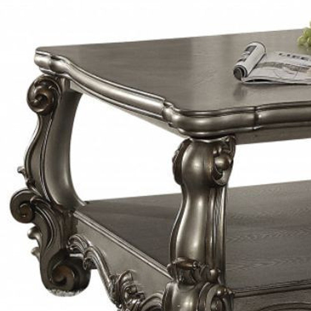Wood and Polyresin Coffee Table with Shelf