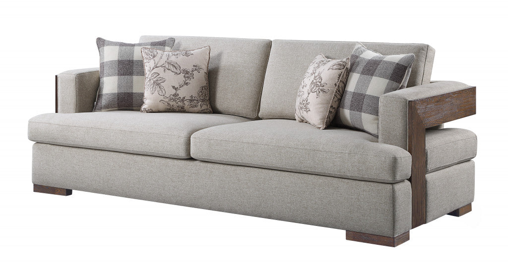Fabric Sofa and Toss Pillows with Brown Legs